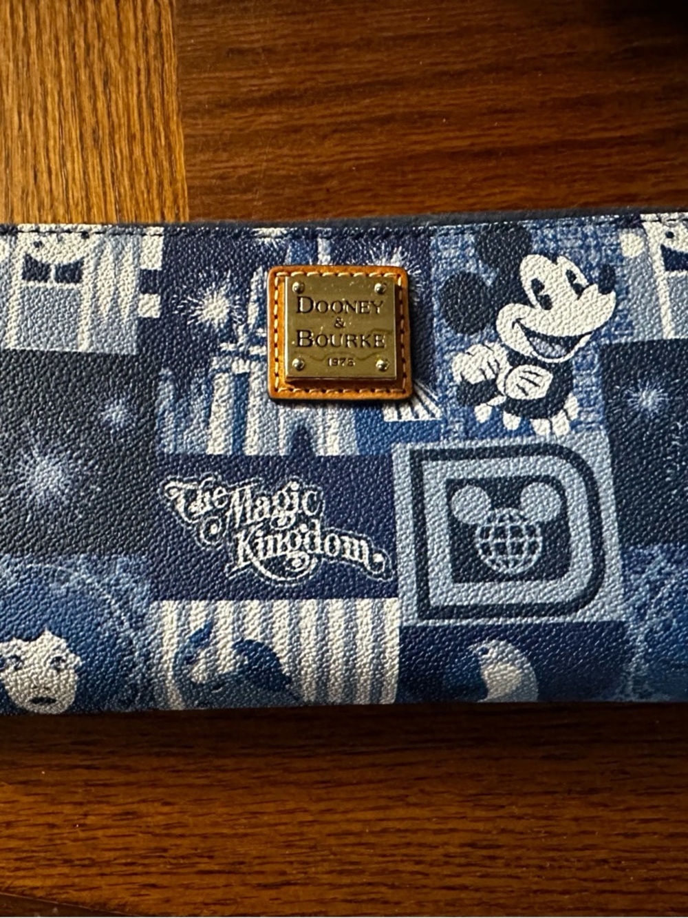 Dooney & Bourke Blue Disney The Magic Kingdom Patterned Wallet with Gold Plaque